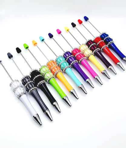 Assorted colorful pens with decorative elements on a white background