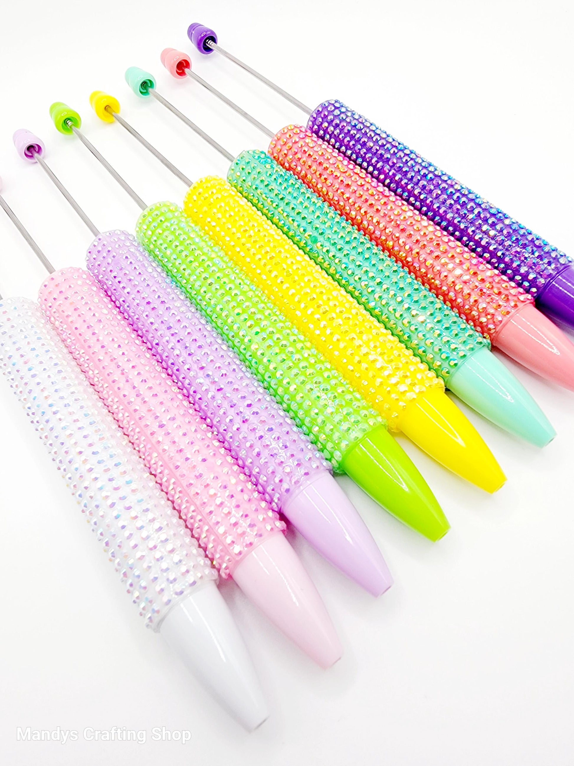 Colorful beaded swab set on a white background