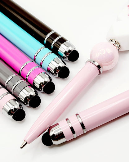 Colorful stylus pens with decorative ends on a white background