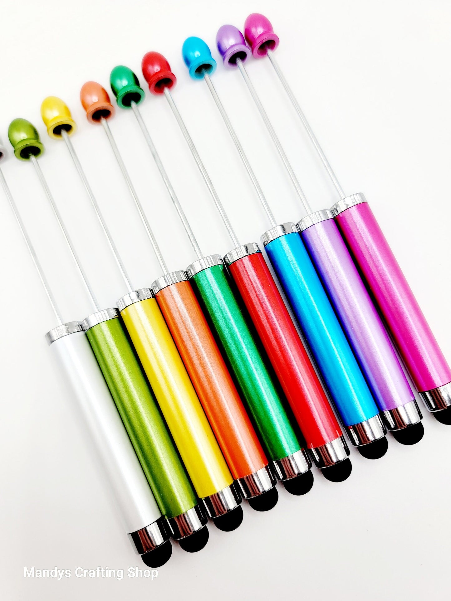 Set of colorful pens with multicolored tips on a white background