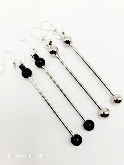 Set of four metal skewers with black ends on a white background, branded 'Mandys Crafting Shop'.