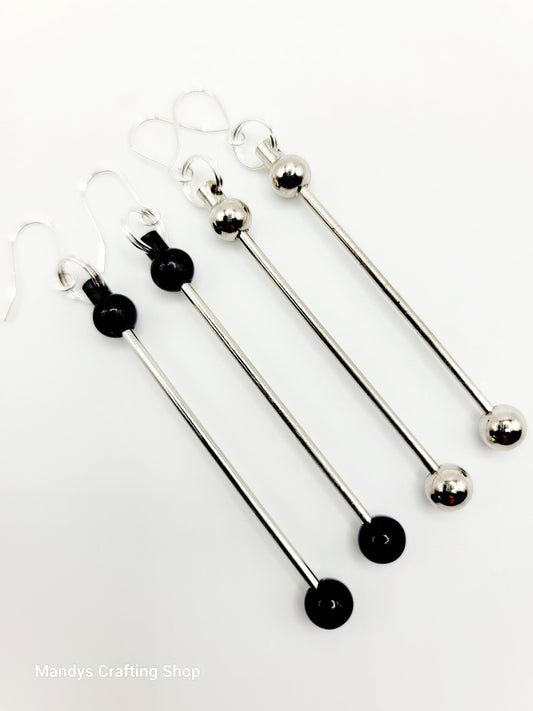 Set of four metal skewers with black ends on a white background, branded 'Mandys Crafting Shop'.