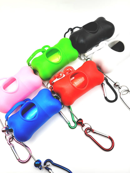 Colorful dog training clickers with carabiners on a white background