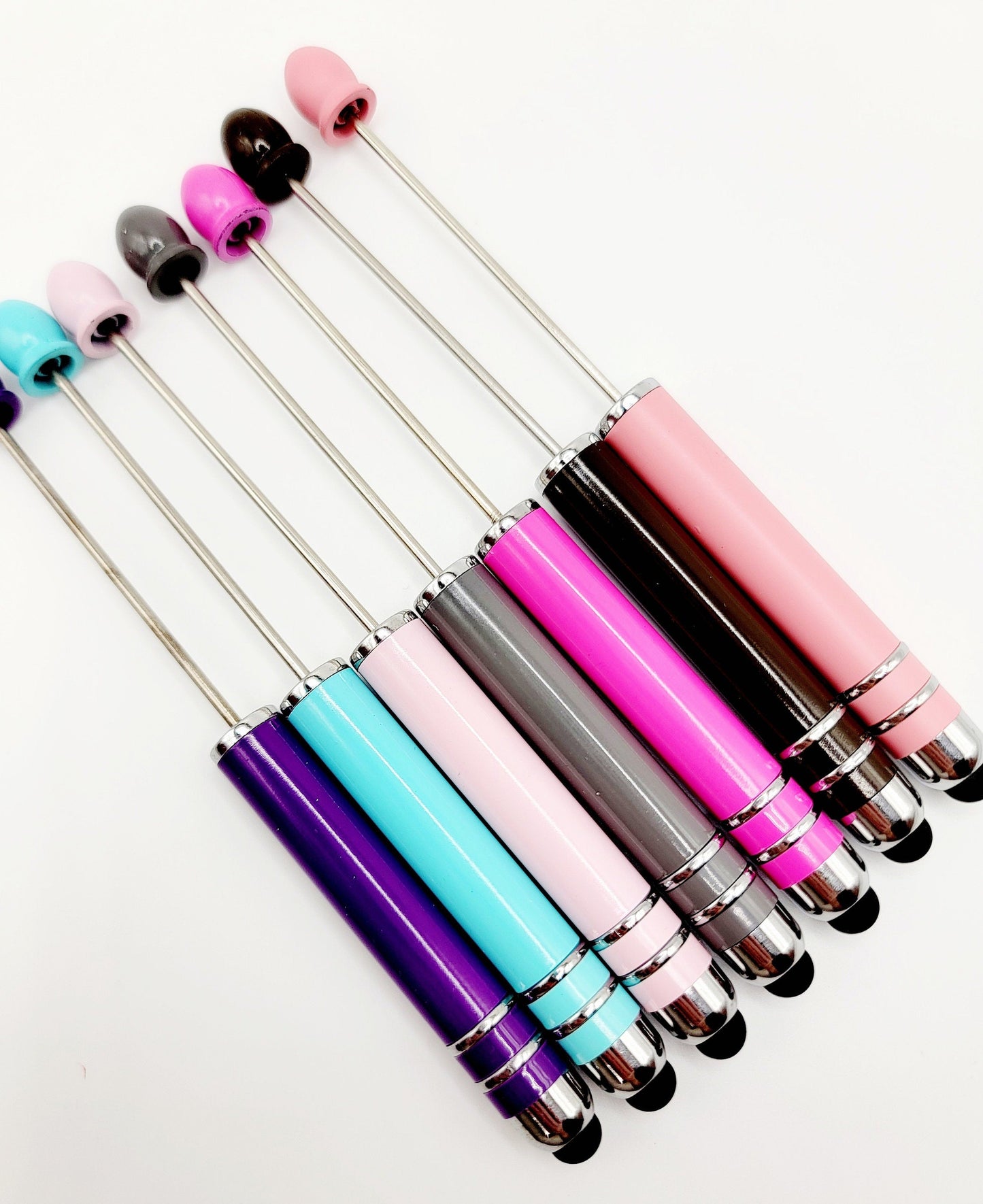 Colorful metal knitting needles on a white background with 'Mandys Crafting Shop' branding.