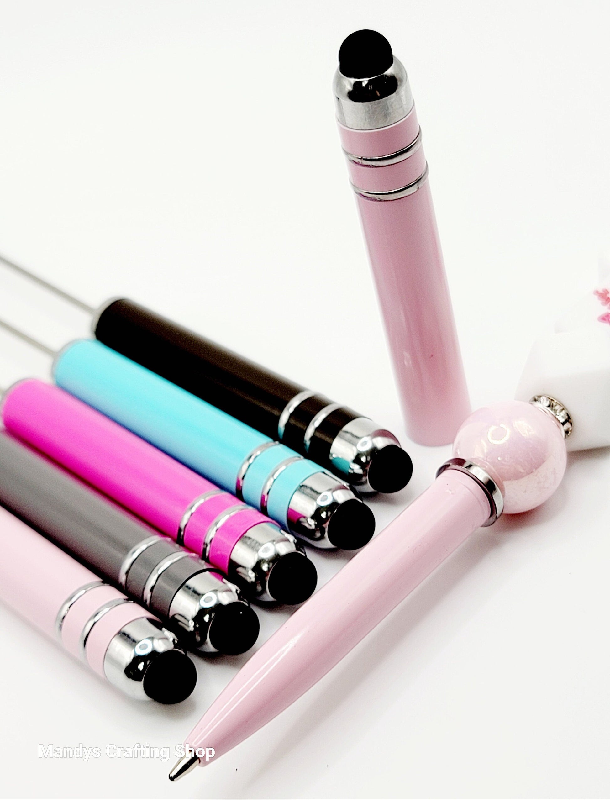 Set of colorful stylus pens on a white background