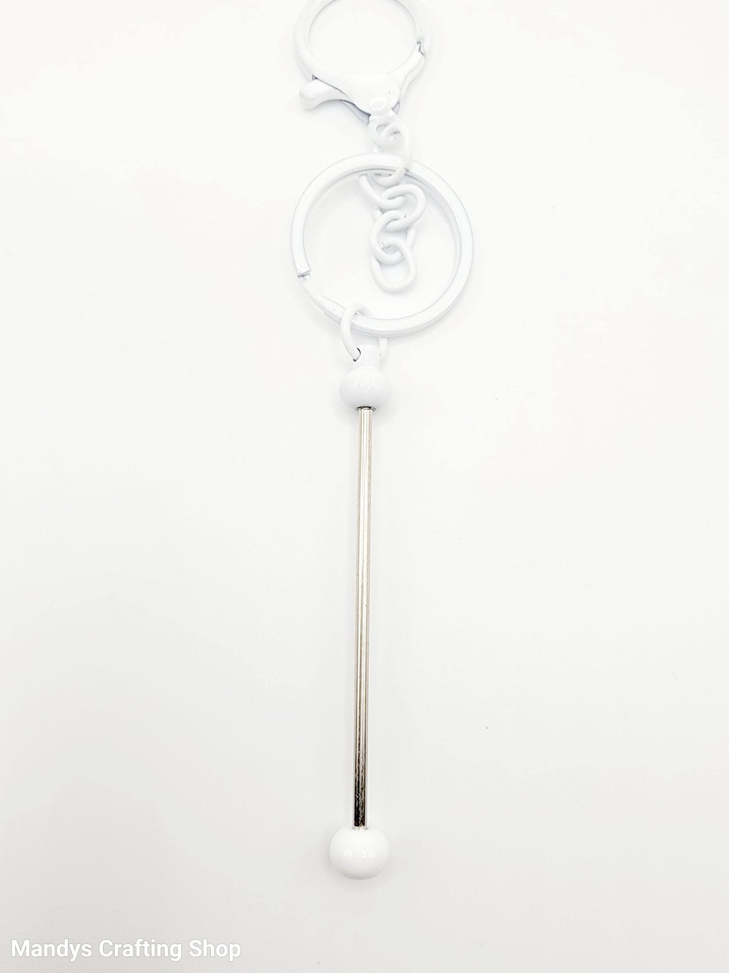 White straw with a decorative top on a white background