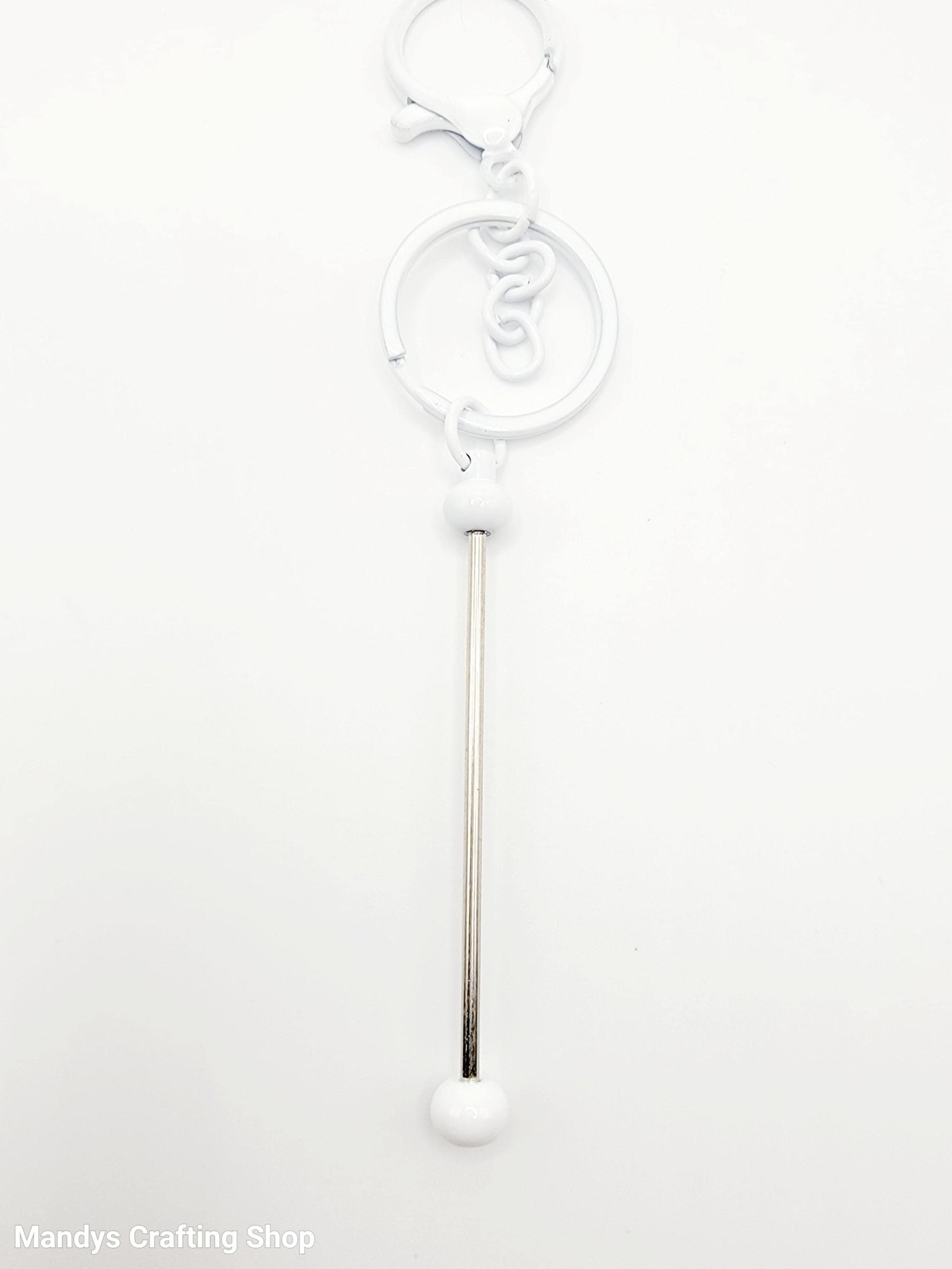 White straw with a decorative top on a white background