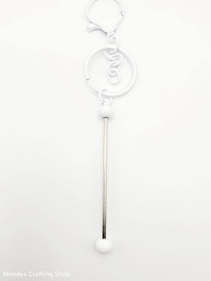 White straw with a decorative top on a white background