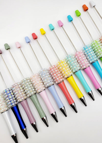 Colorful beaded pens arranged on a white background with 'Mandy's Crafting Shop' branding.