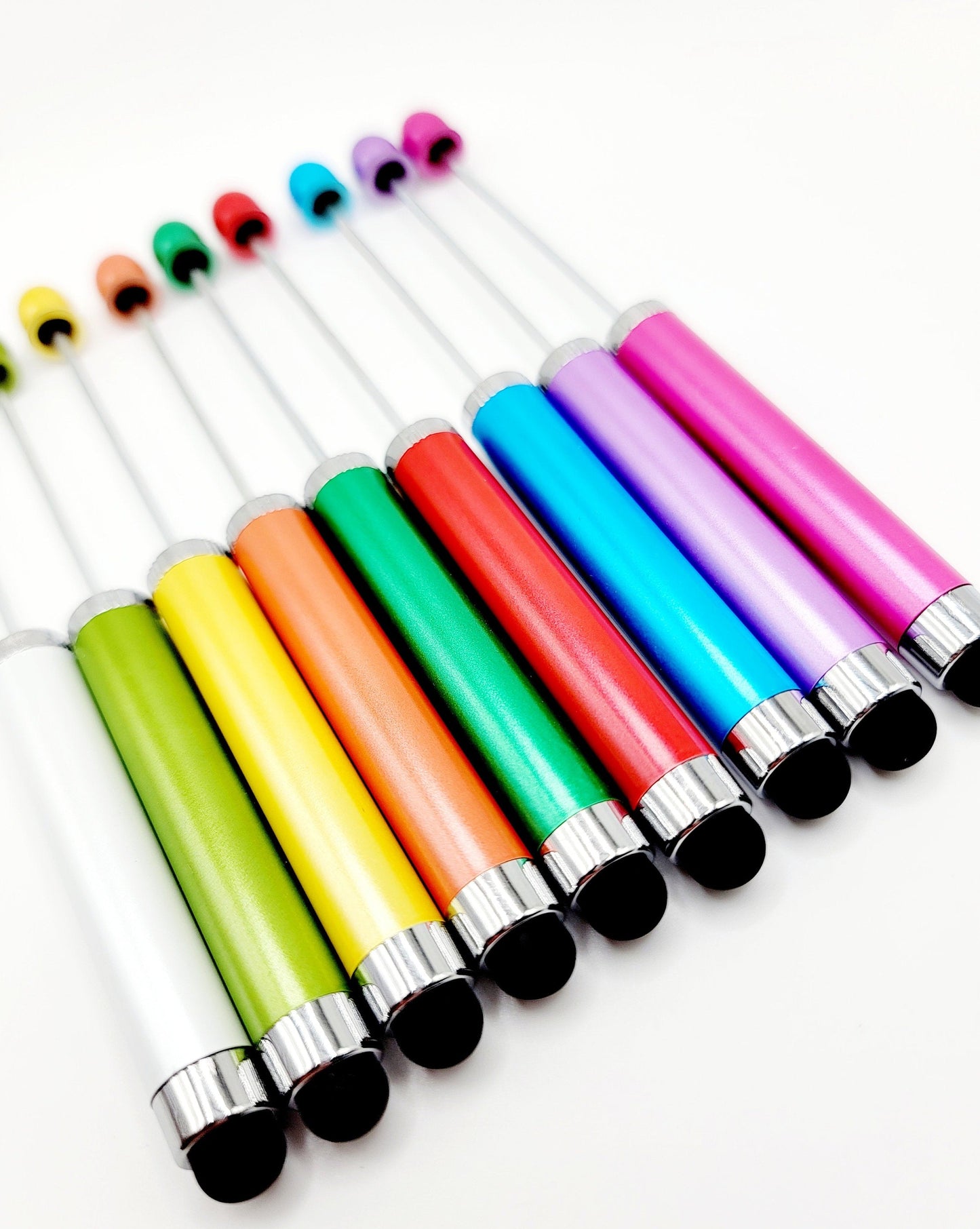 Set of colorful styluses on a white background
