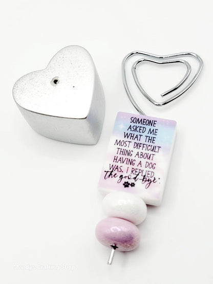Heart-shaped bottle opener with motivational quote on a white background