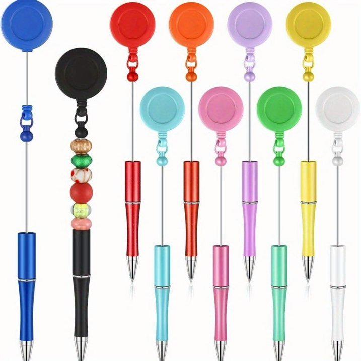 Set of colorful pens with retractable badge holders on a white background