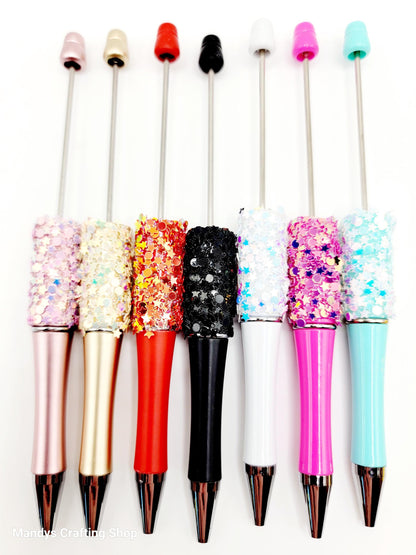 Set of colorful pens with decorative tips on a white background