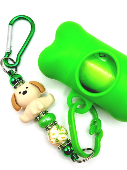 Green keychain with dog-shaped charm and carabiner on a white background