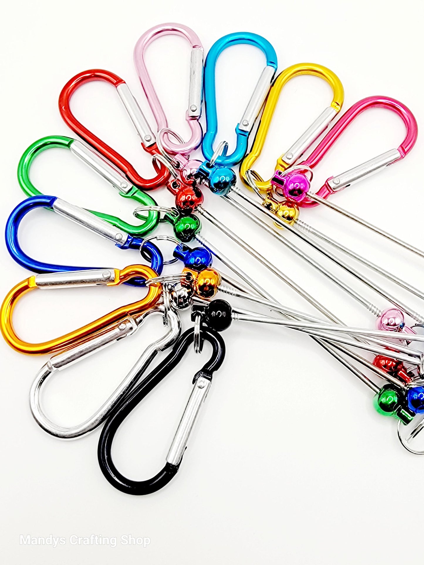 Colorful keychains with carabiners on a white background