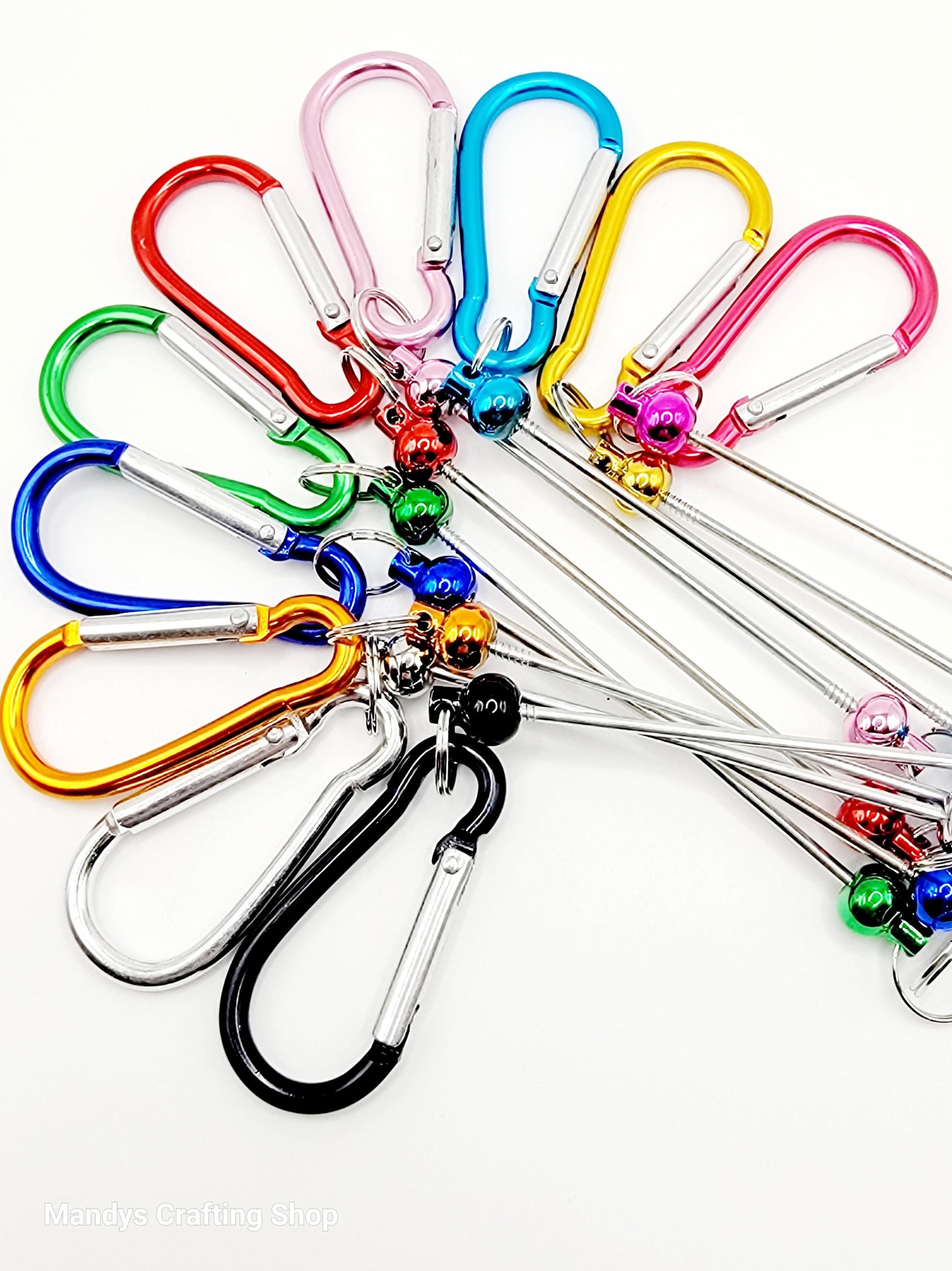 Colorful keychains with carabiners on a white background