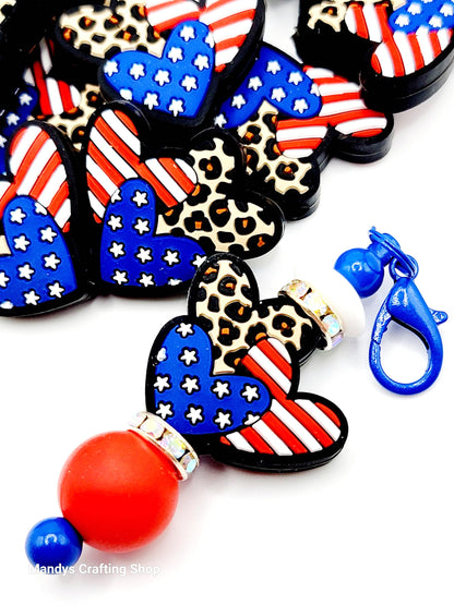 Colorful keychains with American flag design on a white background