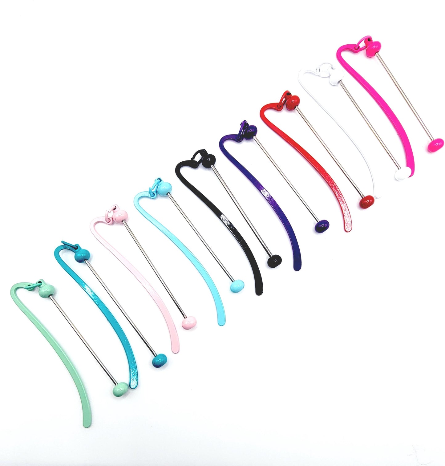Set of colorful straws with different designs on a white background