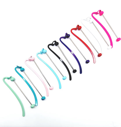 Set of colorful straws with different designs on a white background