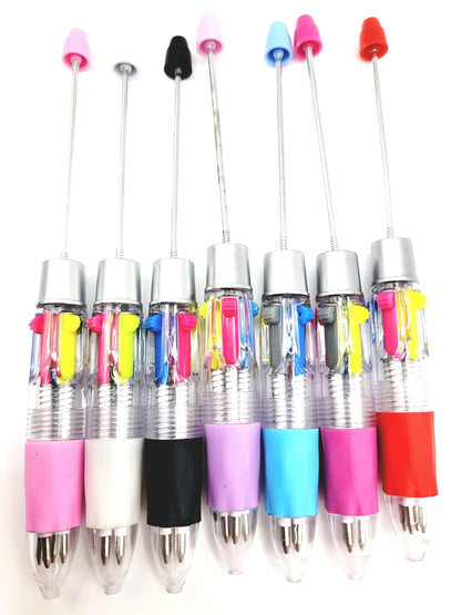 Set of colorful pens with various colored caps on a white background