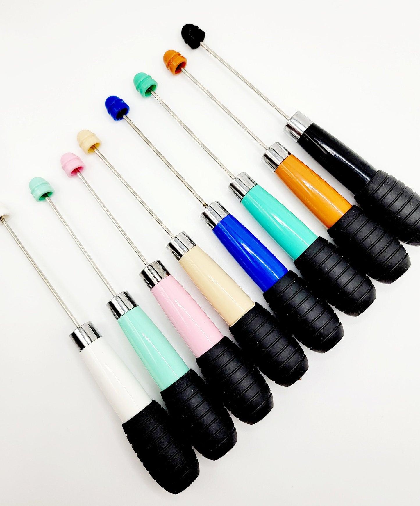 Set of colorful tools with black handles on a white background, labeled 'Mandy's Crafting Shop'.