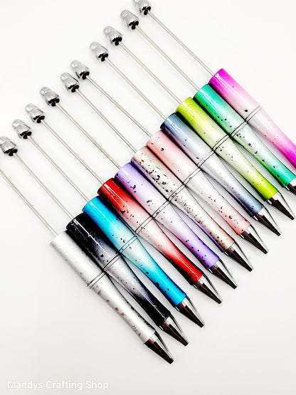 Set of colorful pens with gradient designs on a white background