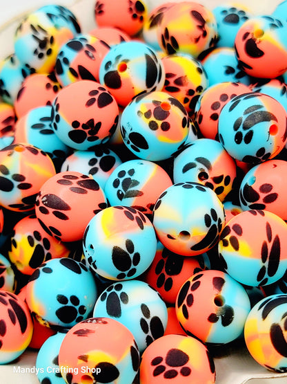 15mm Printed Turquoise, Yellow, & Orange Paw Print Silicone Beads – Round Swirl Paw Print Beads for Pens & Wristlets
