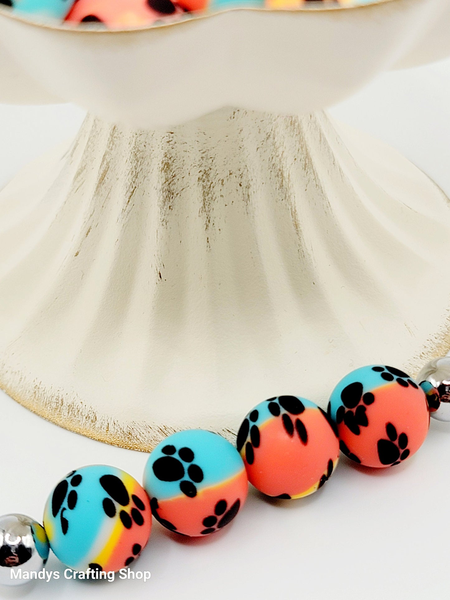 15mm Printed Turquoise, Yellow, & Orange Paw Print Silicone Beads – Round Swirl Paw Print Beads for Pens & Wristlets