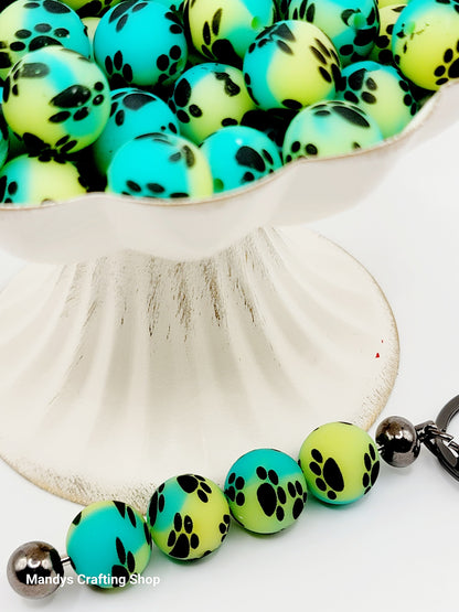 15mm Printed Turquoise & Yellow Paw Print Silicone Beads – Round Pet Beads for Pens & Wristlets