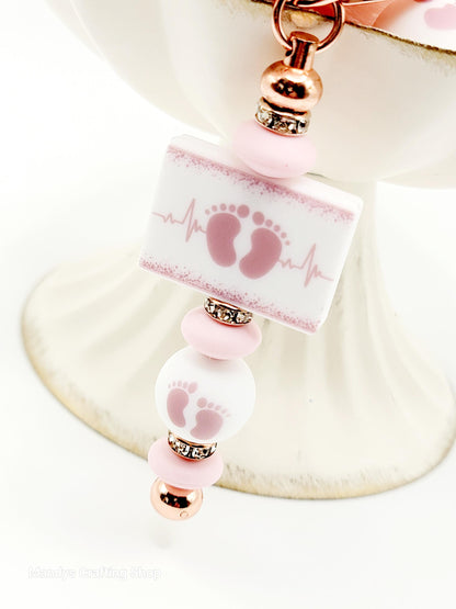 15mm Printed Mauve & White Baby Footprint Silicone Bead – Baby Shower Round Beads for Pens & Keychains