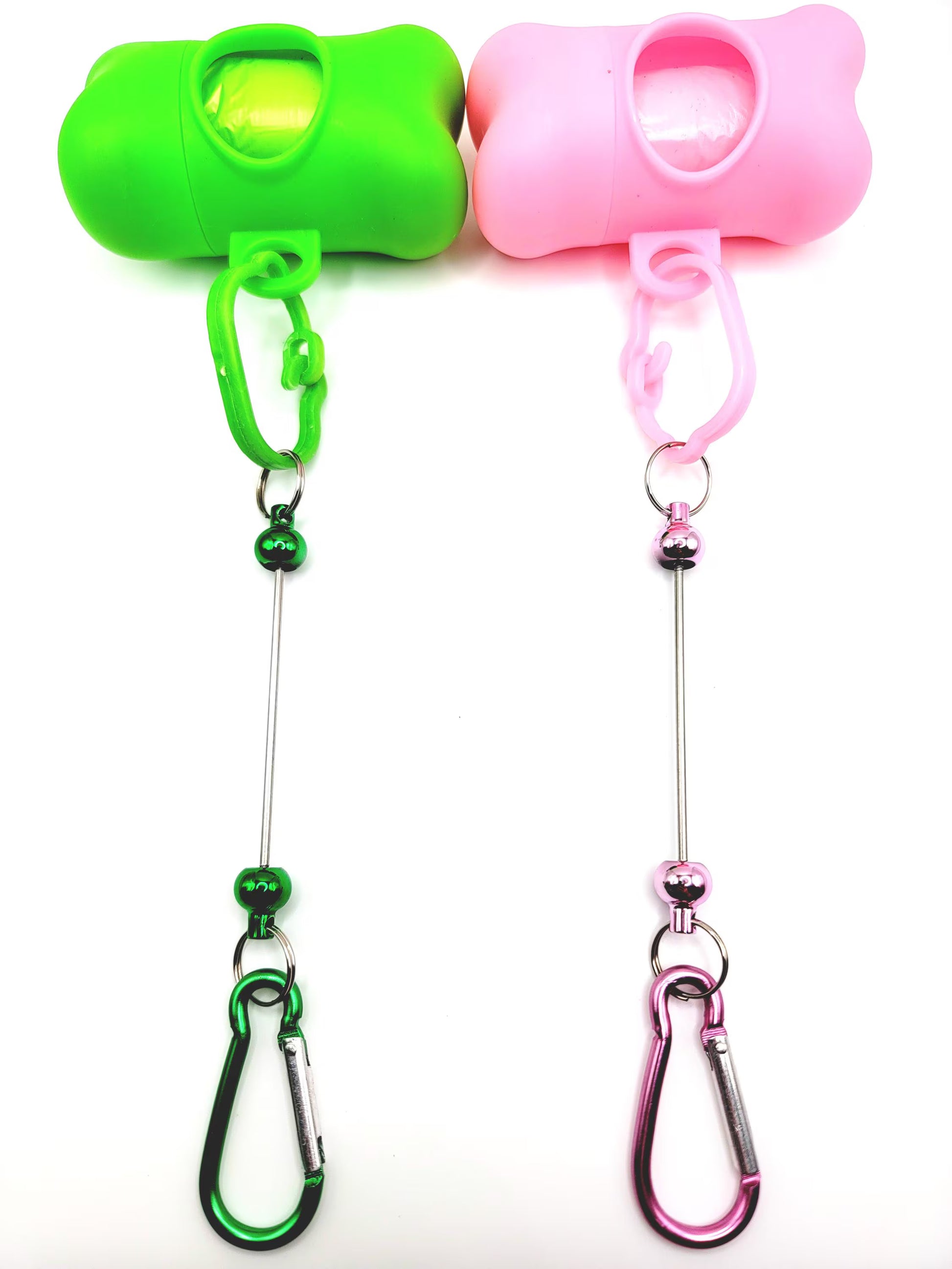 Two colorful keychain holders, one green and one pink, with carabiners on a white background.
