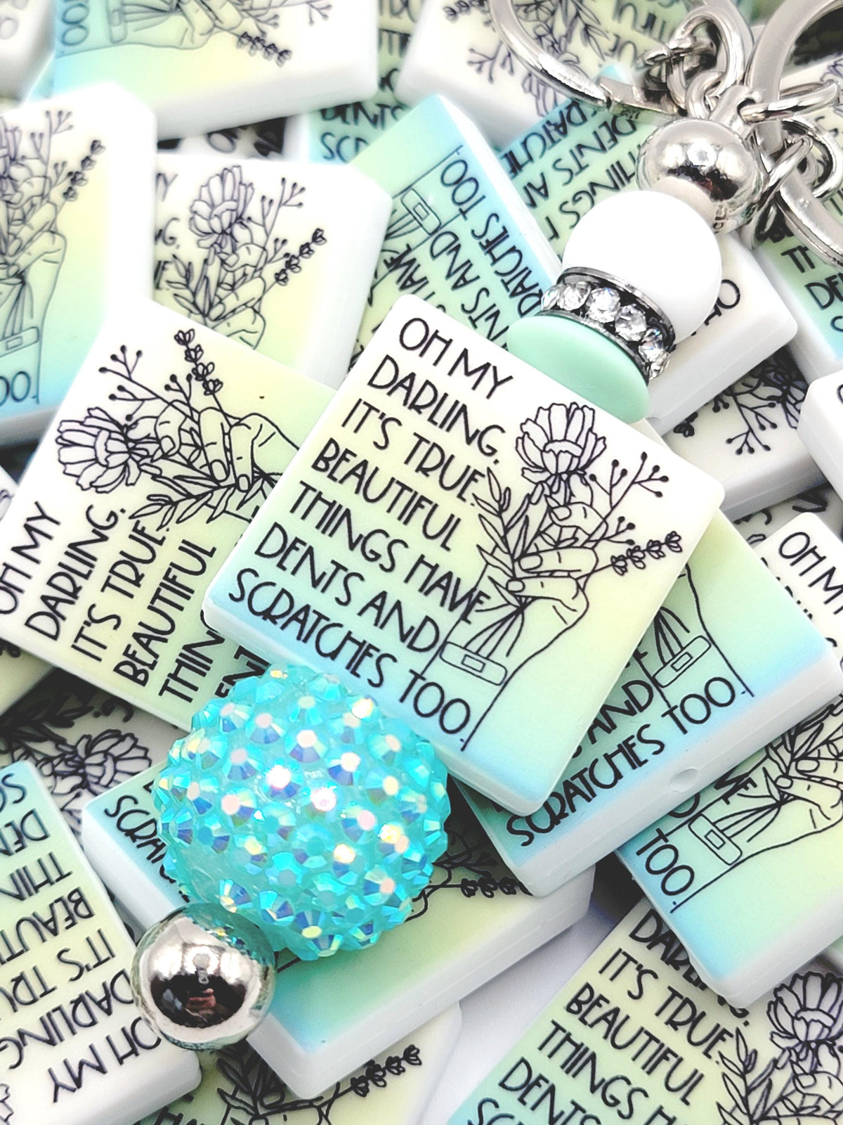 Inspirational focal bead featuring the message “Beautiful Things Have Dents Too” for mental health awareness and DIY beadable pen crafts.