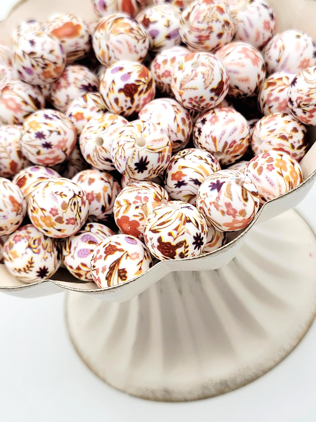 15mm brown floral print silicone round beads with autumn-inspired flower designs for pens, wristlets, keychains, jewelry, and crafts.