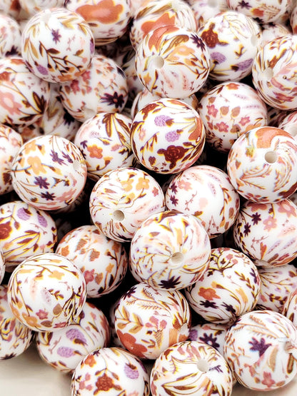 15mm brown floral print silicone round beads with autumn-inspired flower designs for pens, wristlets, keychains, jewelry, and crafts.